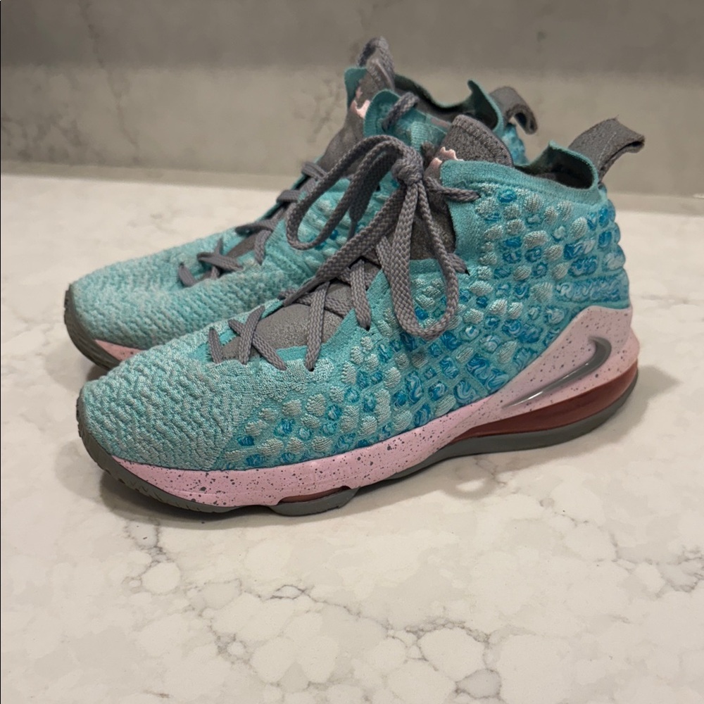 Nike Lebron 17 South Beach GS basketball show in Teal and Pink Colourway.